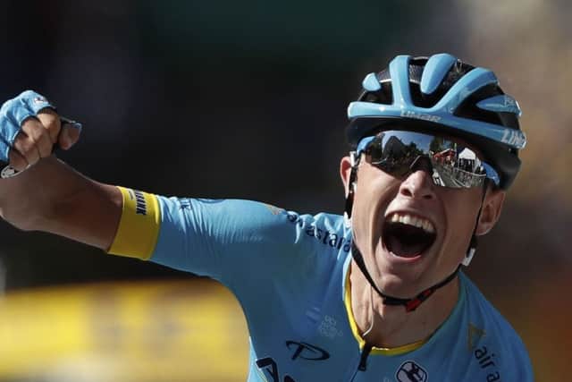 Denmark's Magnus Cort Nielsen clenches his fist as he crosses the finish line to win the fifteenth stage of the Tour de France. Picture: AP/Peter Dejong