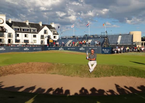 Italy's Francesco Molinari with the The Claret Jug after winning The Open Championship at Carnoustie. Picture: Richard Sellers/PA