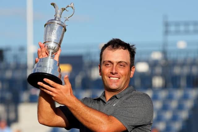 Italy's Francesco Molinari with The Claret Jug. Picture: Richard Sellers/PA