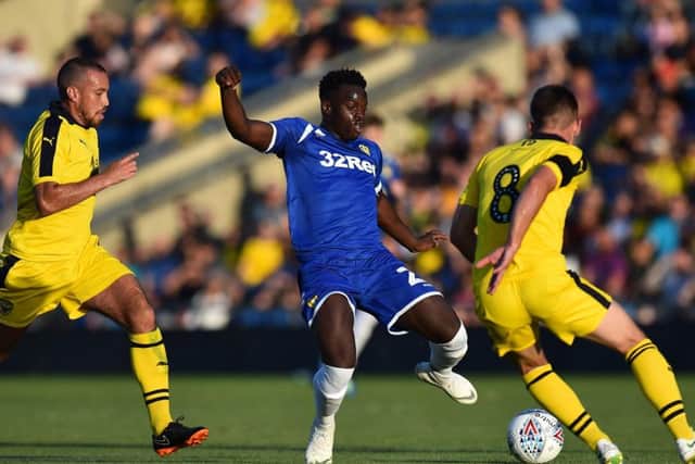 Leeds United's Ronaldo Vieira is outnumbered in midfield in last nights friendly at Oxford United (Picture: Varleys).