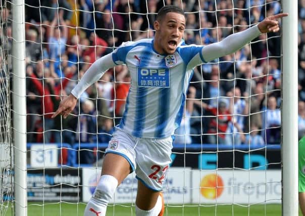 Tom Ince has dropped down from the Premier League with Huddersfield Town to join Stoke City.