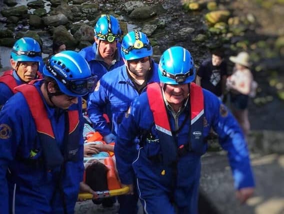 The nine-year-old fell around three metres onto rocks
