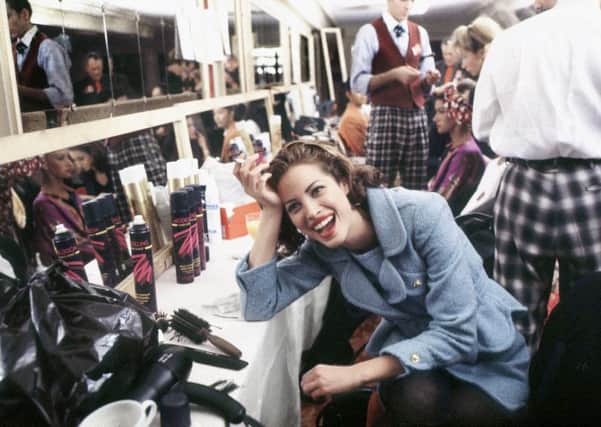 One of Moore's all-time favourite models, Christy Turlington, backstage in 1992 at Chanel. Copyright Catwalking.com.