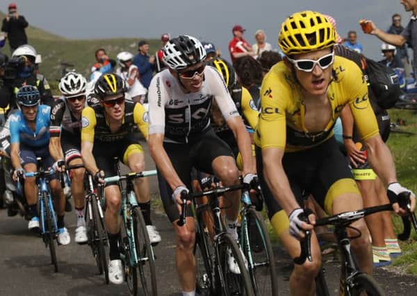 Changing of the guard: He may have been in yellow for a few days but it was only yesterday when Geraint Thomas, right, took charge of Team Skys ambitions and the race itself from a flagging Chris Froome, second right. (Picture: Christophe Ena/AP)
