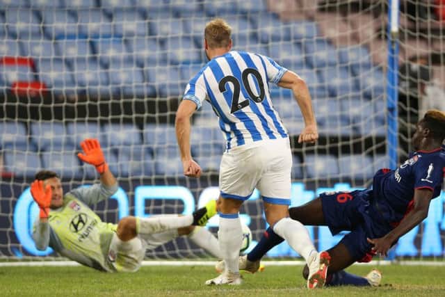Huddersfield Town's Laurent Depoitre scores his side's second goal of the game during a pre-season friendly match at the Kirklees Stadium(Picture: PA)