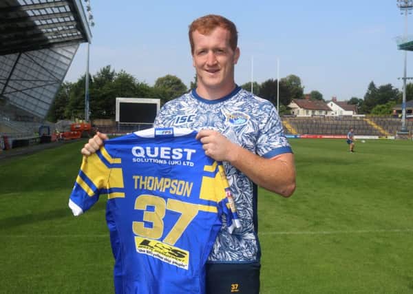 New signing Jordan Thompson with his Leeds Rhinos shirt.