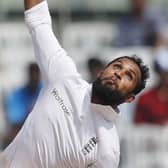 Turning back the clock: England's Adil Rashid blows during their third day of the fifth Test against India in Chennai in 2016.