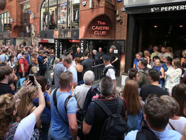 People outside the Cavern Club in Liverpool before an exclusive Sir Paul McCartney gig.