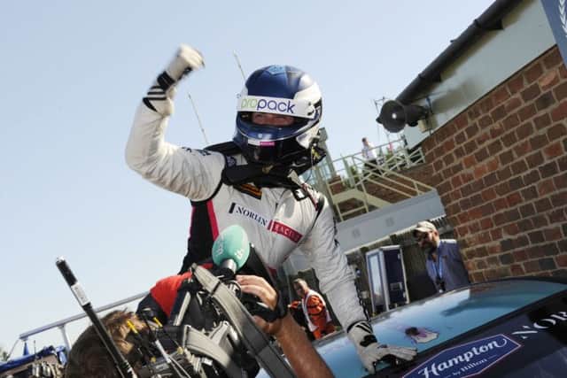 Daniel Lloyd celebrates his victory in the third BTCC race at Croft Circuit last month. Picture: Dan Buckel.