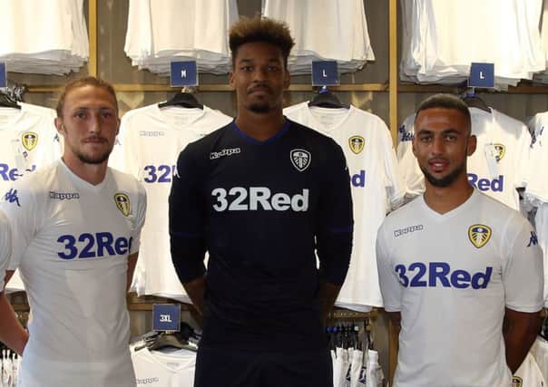 Kemar Roofe, right, with Luke Ayling  and goalkeeper Jamal Blackman in new apparel (Picture: Varley Picture Agency).