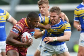 Jermaine McGillvary, seen playing against Leeds Rhinos, scored his second successive hat-trick for Huddersfield Giants on Friday night (Picture: Bruce Rollinson).