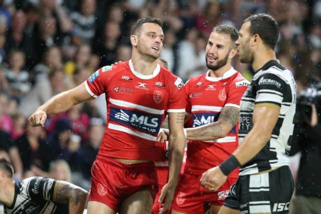 Craig Hall, left, seen with team-mate Ben Crooks, made a brilliant second debut for Hull KR as the Robins halted Hull FCs sequence of seven sucessive wins in the derby. The visitors won a fascinating clash  20-16 (Picture: Hull KR).