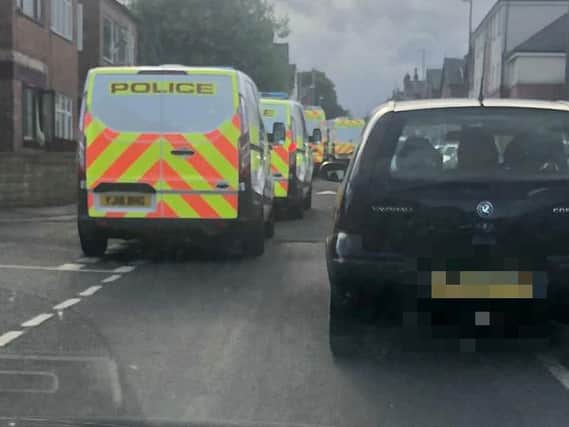 Police vehicles at the scene. PIC: Damian Walker