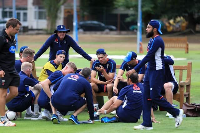 England head coach Trevor Bayliss with his players, including, far right, Yorkshire's Adil Rashid, during a nets session at Edgbaston. Picture: Mike Egerton/PA