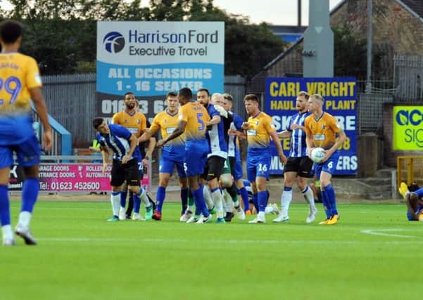 FLASHPOINT: Players from both sides clash in the recent Mansfield Town v Sheffield Wednesday pre-season friendly, which is being investigated by the FA. Picture: Anne Shelley.