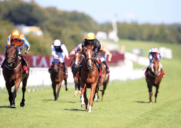 Stradivarius, centre, goes on to win the Goodwood Cup under Andrea Atzeni.