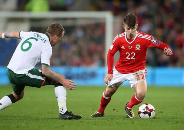 NEW ARRIVAL: Ben Woodburn (right, in action for Wales against Republic of Ireland last year. Picture: Nick Potts/PA