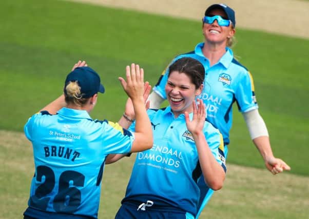 Yorkshire's Alice Davidson-Richards celebrates taking the wicket of Lancashire's Nicole Bolton.