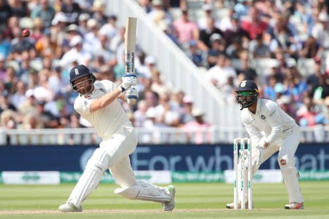England's Jonny Bairstow plays a shotwatched by India wicketkeeper Dinesh Karthik during day one of the Specsavers First Test match at Edgbaston, Birmingham. (Picture: Nick Potts/PA)