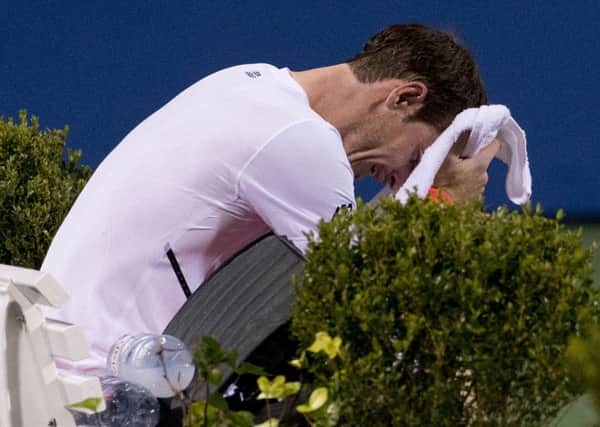 Andy Murray, of Britain, becomes emotional after defeating Marius Copil, of Romania, 6-7(5), 3-6, 7-6(4), during the Citi Open tennis tournament in Washington (AP Photo/Andrew Harnik)
