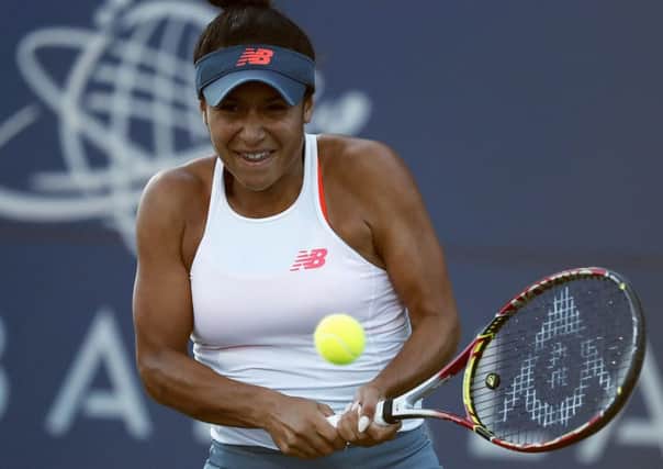 Heather Watson, from Britain, returns the ball to Venus Williams, of the United States, during the Mubadala Silicon Valley Classic tennis tournament in San Jose. (AP Photo/Tony Avelar)