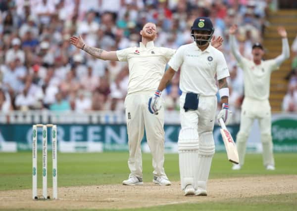 Ben Stokes shows his frustration after an appeal is turned down by the umpire as India batsman Virat Kohli looks on at Edgbaston. Picture: Nick Potts/PA