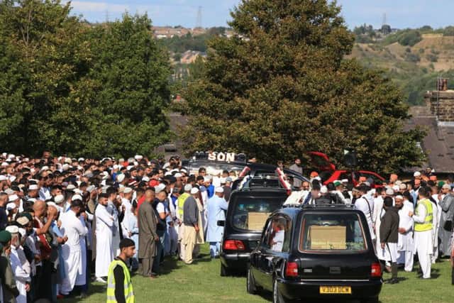 Thousands of people attended the funeral in Bradford