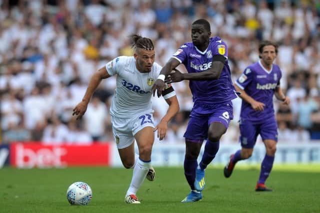 Leeds' Kalvin Phillips and Stoke's Badou chase the ball. (Picture:Tony Johnson)