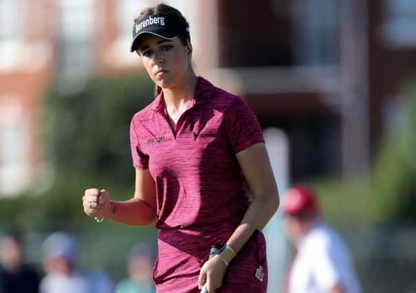 Holding her nerve: Georgia Hall celebrates a birdie on the 16th that gave her the lead of the womens British Open for the first time. (Picture: Richard Sellers/PA)