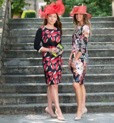 James Lakeland red/black dress, Â£159, and floral print dress, Â£189. Hats from the Julie Fitzmaurice Hat Collection, prices start from Â£95, and certain styles can be dyed to match.