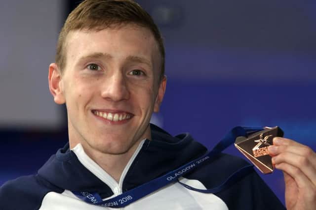 Max Litchfield with his bronze medal