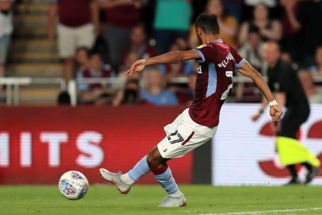 Aston Villa's Ahmed Elmohamady scores his side's second goal against Hull City on Monday night (Picture: Mike Egerton/PA Wire).