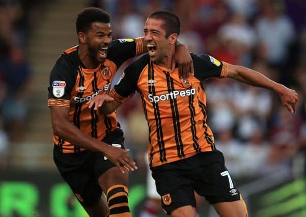 On target: Hull City's Evandro Goebel, right, celebrates scoring against Villa with Fraizer Campbell.