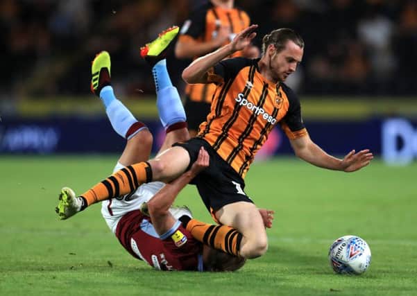 Hull City's Will Keane and Aston Villa's Birkir Bjarnason during the Sky Bet Championship match at the KCOM Stadium (Pictures: Mike Egerton/PA Wire)