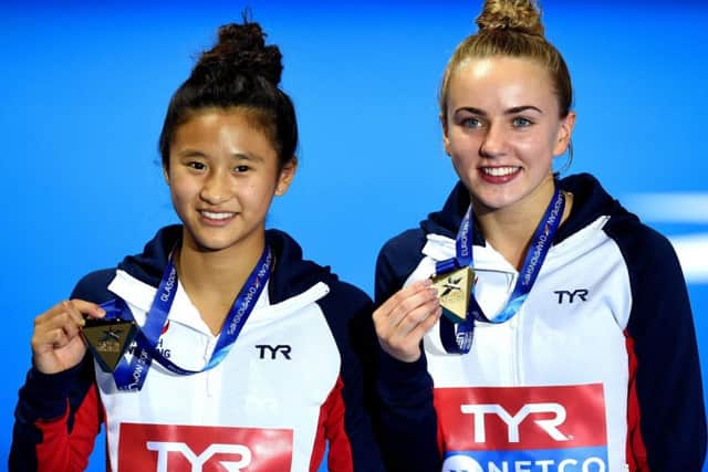 Huddersfield's Lois Toulson, right, and Eden Cheng display their gold medals won in the women's synchronised 10m platform (Picture: Ian Rutherford/PA Wire).