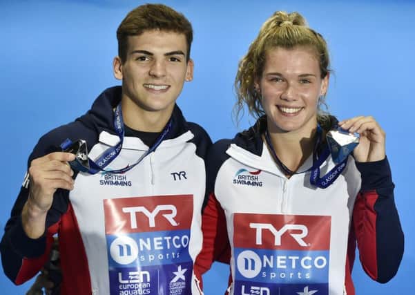 Great Britain's Ross Haslam and Grace Reid (silver) on the podium for the Mixed Sychronised 3m Springboard during day seven of the 2018 European Championships at Royal Commonwealth Pool Edinburgh. (Pictures: PA)