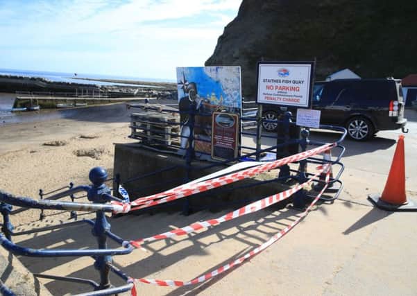 Police tape near the beach at Seaton Garth in Staithes. PIC: PA