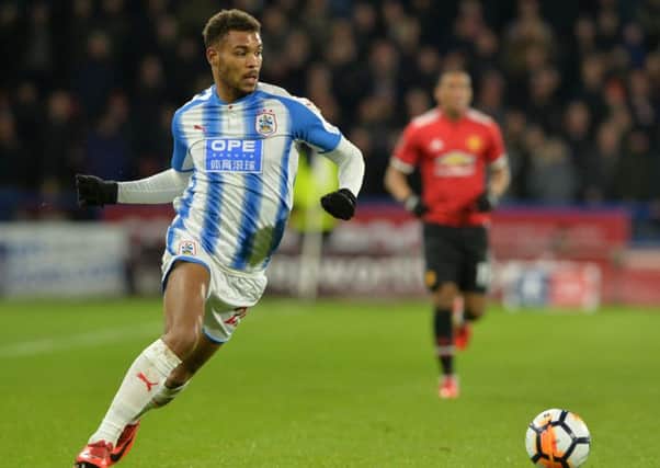 Huddersfield Town's Steve Mounie pictured in action against Manchester United in the FA Cup last February (Picture: Bruce Rollinson).