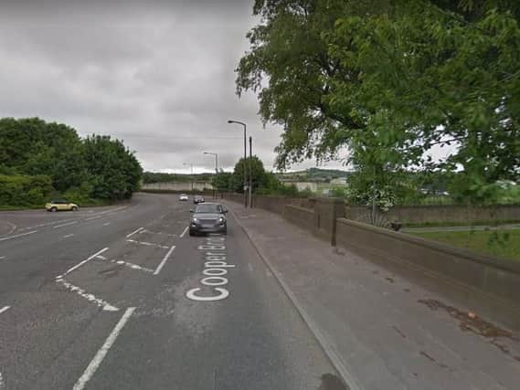A 78-year-old woman was fatally injured in the crash on Cooper Bridge Road, Mirfield.