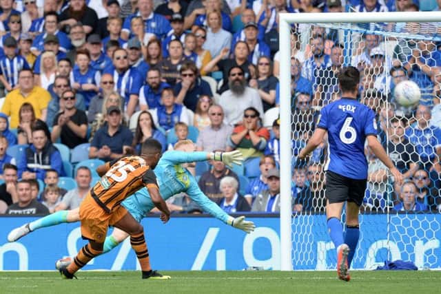 Opener: Hull City take the lead as Frazier Campbell slams the ball past goalkeeper Cameron Dawson.