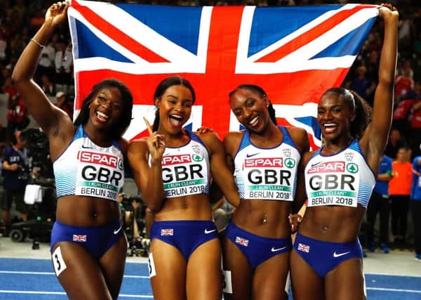 Great Britain's Asha Philip (left), Imani Lansiquot, Bianca Williams (second right), and Dina Asher-Smith (right) celebrate winning the gold medal in the women's 4x100m relay final. PIC: Martin Rickett/PA Wire
