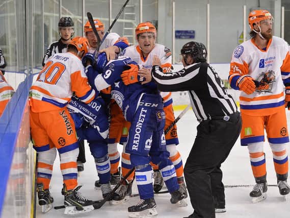 TEMPERS FLARE: Davey Phillips and Jonathan Phillips were ejected for their part in this last-minute brawl on Sunday night. Picture: Dean Woolley.