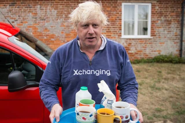 Boris Johnson outside his country home on Sunday.