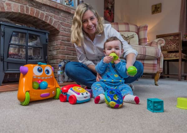 Andrewa Jenkyns MP and her young son Clifford.