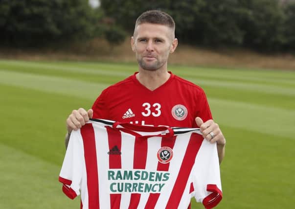 Oliver Norwood poses for pictures after signing for Sheffield United (Picture: Simon Bellis/Sportimage)