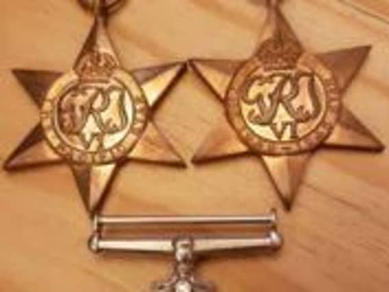 Two of the stolen medals
