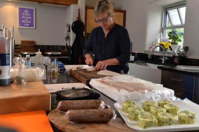 Georgina Anderson, prepares food for a shooting party, she  runs Lady G's catering, which provides catering for shoot parties on moors and dinners for parties too.
Picture Bruce Rollinson