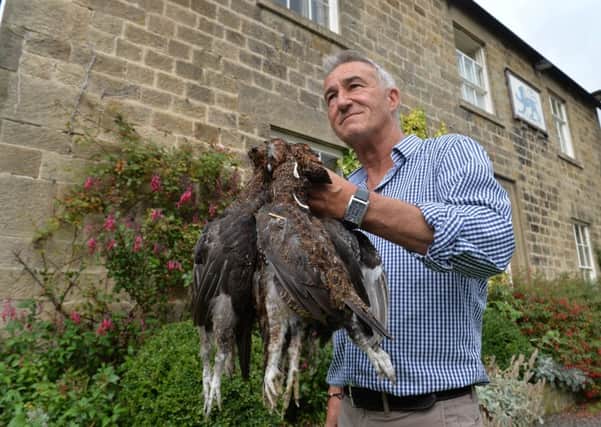 Paul Klein with grouse from a local shoot destined for tonight's diners at the Blue Lion, he has run the Blue Lion in East Witton for 28 years.   Picture Bruce Rollinson
