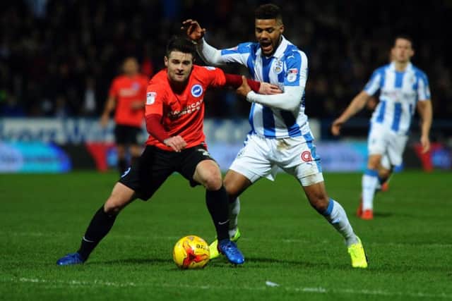 Oliver Norwood playing for Brighton & Hove Albion against Huddersfield Town in the Championship 18 months ago (Picture: Jonathan Gawthorpe).
