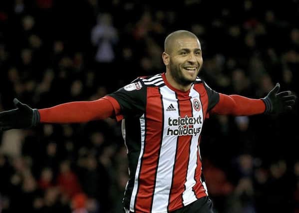 Hat-trick: Sheffield United's Leon Clarke celebrates the third of his four goals against the Tigers.